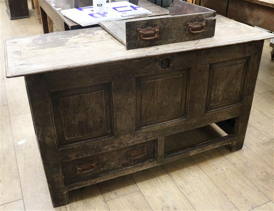 An 18th century oak mule chest W.132cm